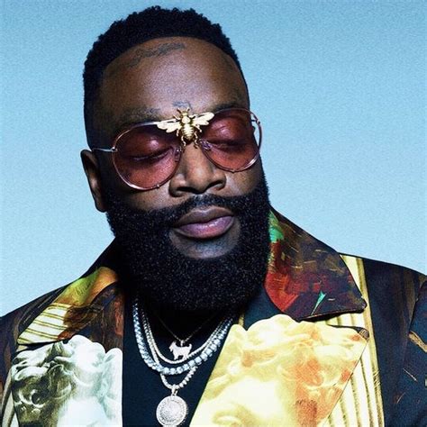 Rick Ross in I’ll Be Rich Forever Bee Sunglasses 